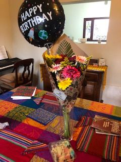 my birthday flowers & a balloon given to me by the woman who sold me the flowers :)